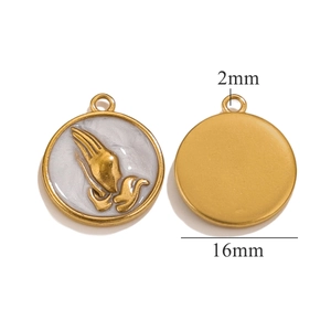 Macro detail of 16mm gold prayer hands pendant with white marble enamel finish
