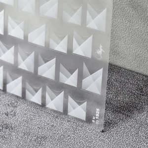 Macro di adesivi per unghie sottili traslucidi con motivi geometrici a triangolo