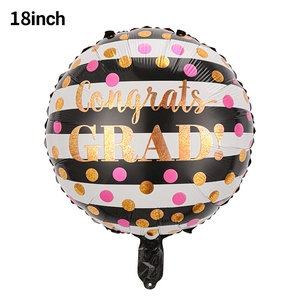 Detail of 18-inch congrats grad foil balloon with black stripes and gold pink dots