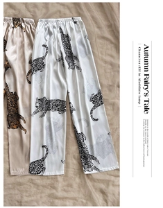 Close-up of leopard print ice silk pajamas with elastic waist and smooth satin texture