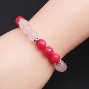 Bracelet en perles d'agate rouge foncé et rose clair avec intercalaires en strass argentés