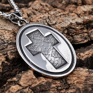 Vintage silver stainless steel cross pendant with cracked texture on oval base and chain