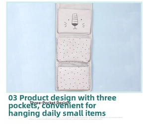 Three-pocket hanging wall organizer featuring cartoon design and black polka dots