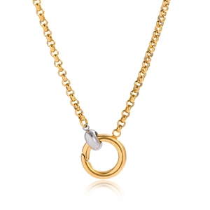 Macro detail of 18K gold and silver two-tone rolo chain necklace with round spring clasp