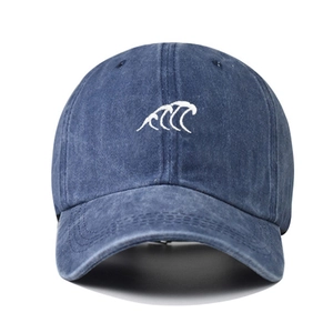 Classic navy blue washed denim baseball cap with white wave embroidery on front panel