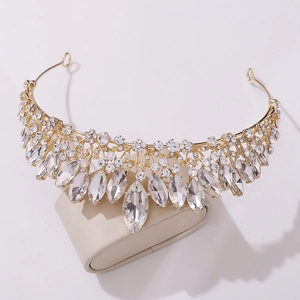 Luxurious bridal tiara in gold alloy with clear sparkling marquise cut crystals