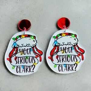 Christmas acrylic drop earrings featuring Clark caricature and colorful festive lights