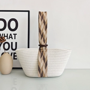 Minimalist white cotton rope woven tote bag with brown herringbone ribbon handles