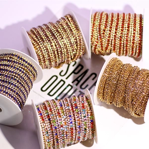 Three-row AB rhinestone claw chain in various colors including blue, red and champagne gold