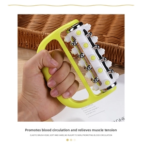 Detail of handheld green roller massager with massage beads for body relaxation