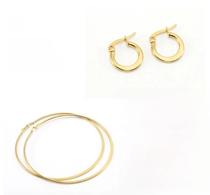 Detail of gold-plated stainless steel hoop earrings in polished thick and thin styles