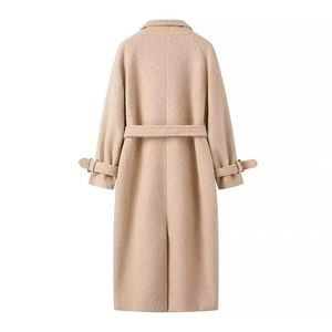 Detailed back view of a long beige wool coat showing center seam and adjustable waist belt