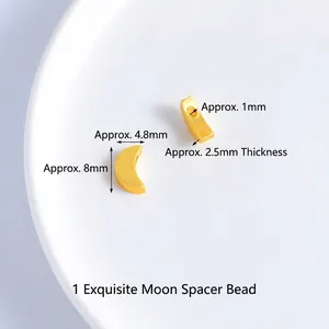Close-up of matte gold moon-shaped spacer bead with dimensions 8x4.8x2.5mm for DIY jewelry