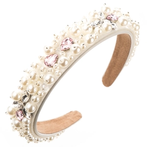 Detail of fabric headband with pearls, pink crystals, and marquis gems on ivory fabric