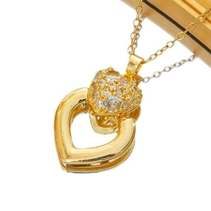 Elegant gold double heart necklace with sparkling pavé cubic zirconia crystals
