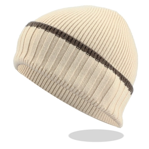 Detail of soft ribbed knit beanie with brown stripe pattern and thick texture