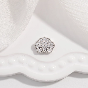 Macro detail of S925 silver cloud pendant with micro-pave white zircon inlay