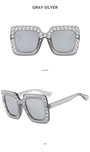 Front and side view of gray-silver square sunglasses with sparkling rhinestone inlay