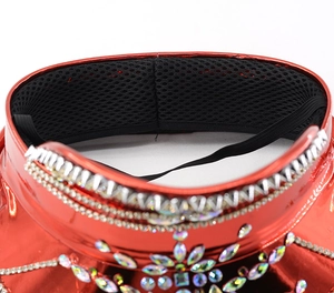 Detailed close-up of red sequin captain hat with rhinestones and breathable mesh lining