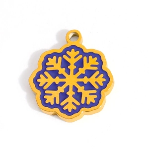 Golden snowflake charm with dark blue enamel inlay for DIY jewelry making