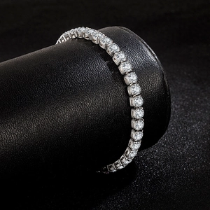 Classic silver tennis bracelet featuring a single row of sparkling round clear zircons