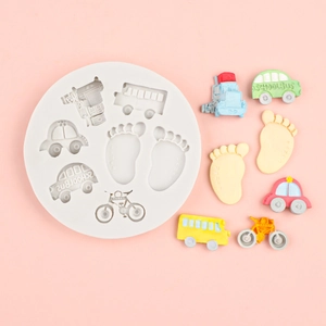 Round silicone mold with school bus and baby footprint shapes for DIY cake toppers