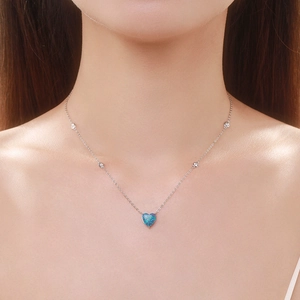 Elegant S925 sterling silver necklace with heart-shaped blue opal and sparkling zircon