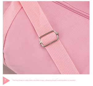 Close-up of pink dance bag featuring an adjustable shoulder strap with metal buckle
