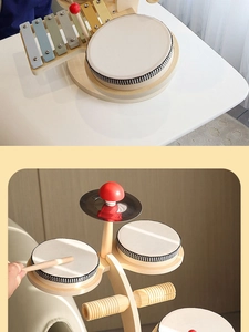 Dettaglio del set di strumenti musicali in legno con xilofono e tamburello per bambini