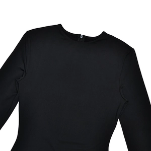Detail view of the black round neck and back zipper on this slim fit long sleeve dress