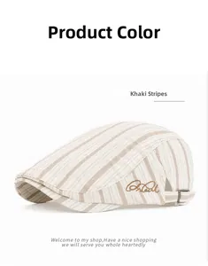 Detail of British style khaki striped flat cap with side embroidery and metal buckle