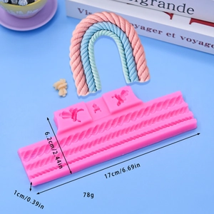 Pink silicone rope twist mold for cake decorating and DIY chocolate butterfly motifs