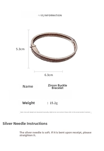 Technical drawing of a zircon buckle bangle showing dimensions 5.3cm x 6.3cm and 15.2g weight