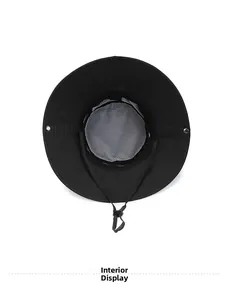 Interior detail of black outdoor sun hat showing breathable white mesh lining and cord