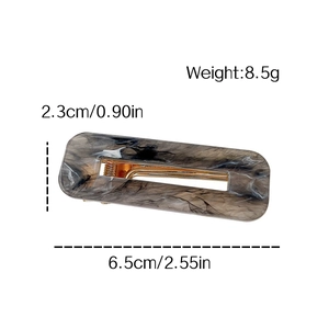 Rectangle acrylic hair clip with grey marble pattern shown with size and weight metrics