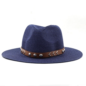 Classic dark blue straw fedora hat with brown leather band and metallic studs