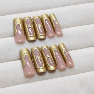 French style matte gold and nude pink long coffin press-on nails with 3D pearl accents