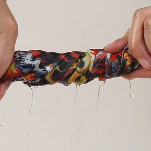Detail showing the water absorption and quick-dry performance of the skull print headscarf