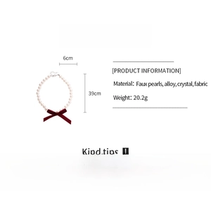 Detail specifications of faux pearl necklace with red velvet bow and crystal center
