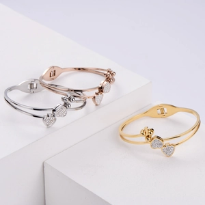Three-color minimalist open heart bracelets with pavé zircons in gold, silver, and rose gold