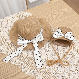Matching straw hat and crossbody bag set for kids with polka dot bow and wavy edges