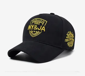 Close-up of black baseball cap with yellow NY&JA embroidery and side stitch detail