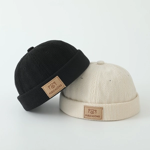Kids corduroy docker hats in black and beige with cute bear patch for boys and girls