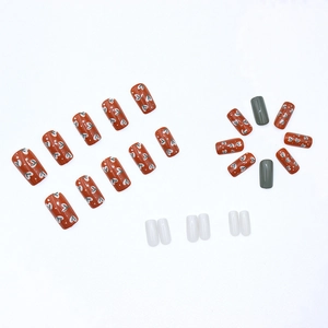 Press-on nail kit with vintage brick red heart patterns and olive green glossy finish