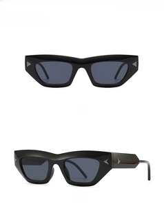 Front and 45-degree side view of black cat-eye sunglasses with silver triangle metal accents