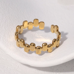 Adjustable 18k gold plated stainless steel open ring with a geometric wave link design
