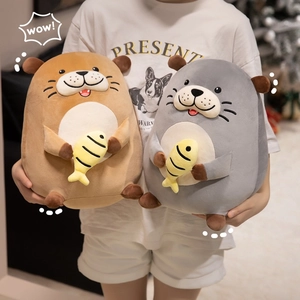 Cute otter plush dolls in grey and brown holding small yellow fish for kids comfort