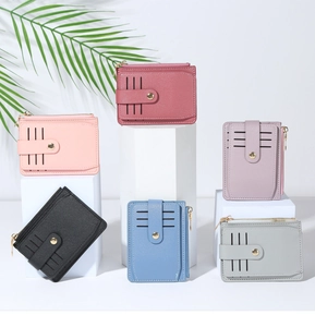 Detailed arrangement of multi-color PU leather wallets on white geometric stands