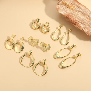 Exquisite 6-pair set of gold-plated geometric hollow hoop and bow drop earrings for women