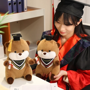 Plush graduation otter doll with black doctoral cap and congratulations scarf